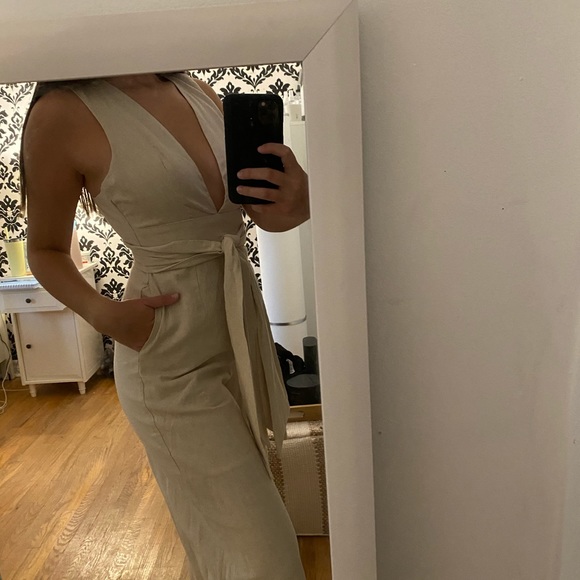 Beige/natural linen flared leg jumpsuit with tie. - Picture 1 of 5